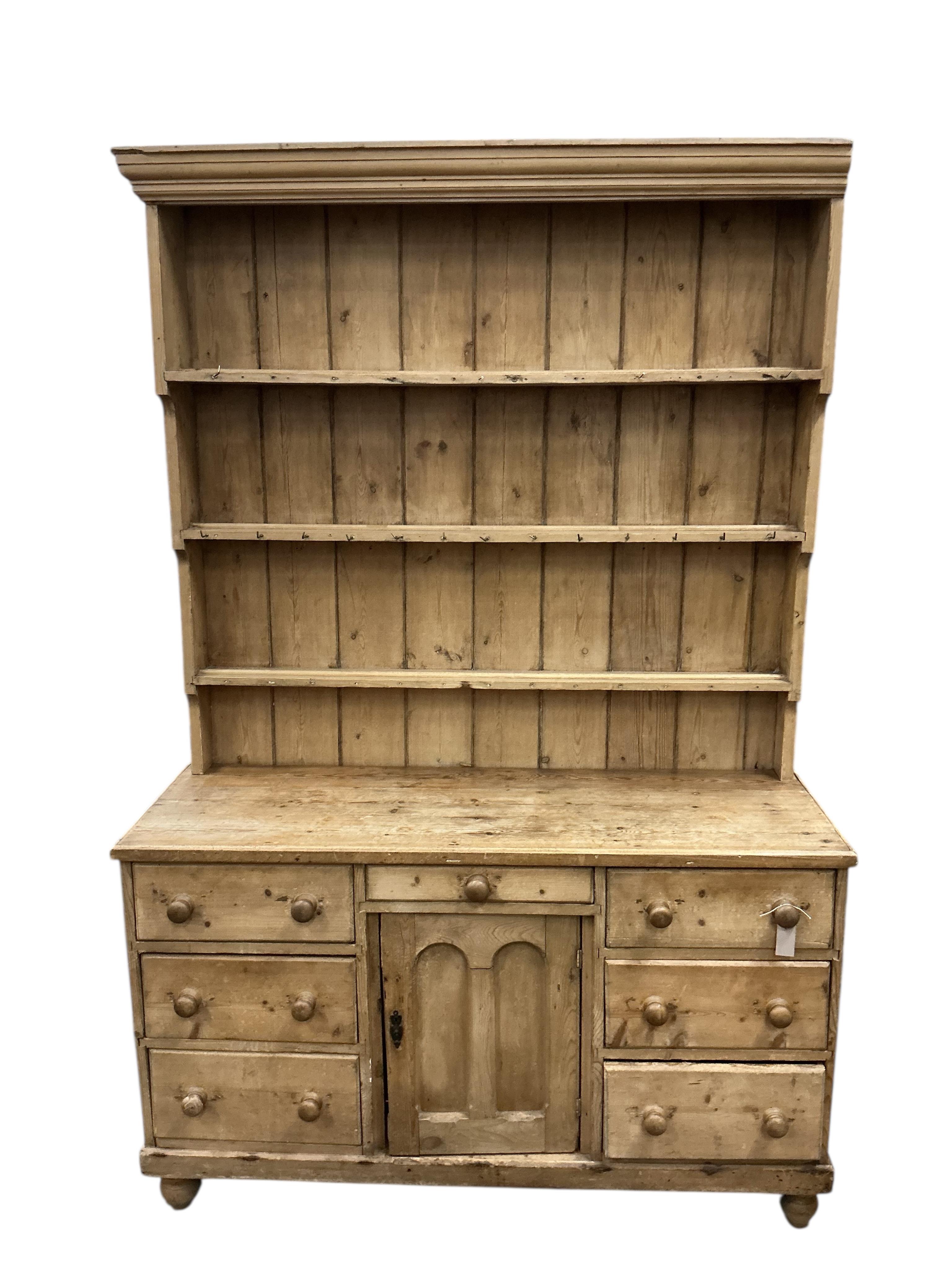 A Victorian pine dresser with boarded rack, width 148cm, depth 48cm, height 224cm
